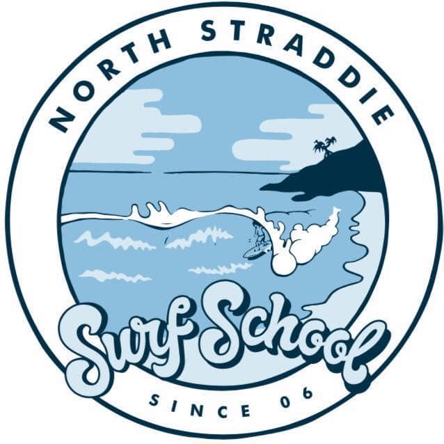 Logo for North Straddie Surf School, featuring a surfer on waves near a coast.